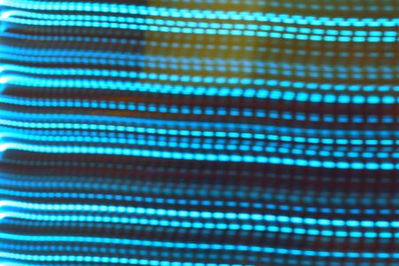 Many blue color light dashed line horizontal on black background