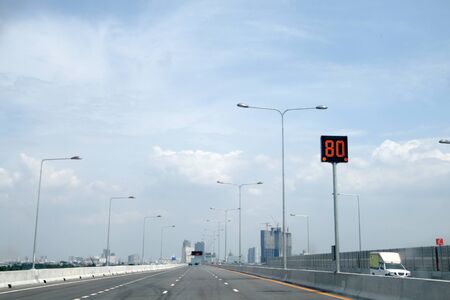 road of expressway in Bangkok, Thailand  have sign for reduce speed of car to 80 kilometer per hour