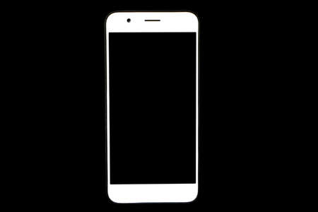 White cellphone on black background have copy space for put text or web screenの写真素材