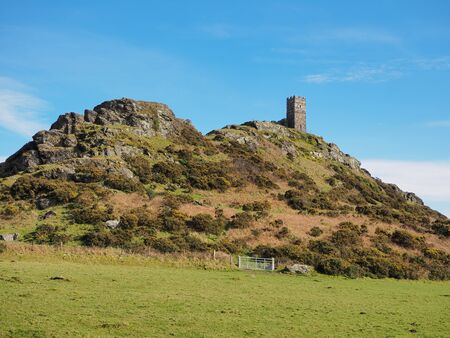 The isolated 13th century church of St Michael de Rupe which sits on top of Brent Tor, an old...