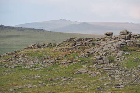 Looking from Great Staple Tor over Roos Tor to north Dartmoor and the highest point of High Willhays, Dartmoor National Park, Devon, UKの写真素材