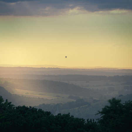 Evening view near to sunset from the top of Butser Hill, the highest point on the chalk ridge of the...