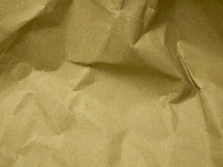 abstract background texture from brown paperの写真素材