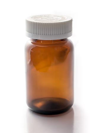 brown bottle on white background isoalateの写真素材