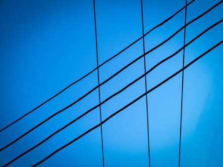 electric wire with blue skyの写真素材
