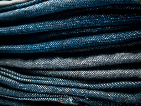 Stack of jeans Backgroundの写真素材