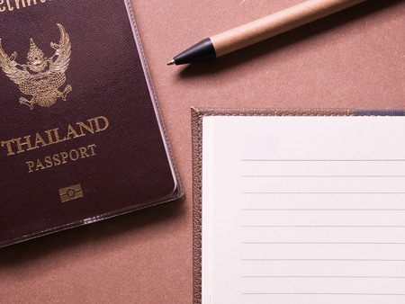 business set of thailand passport and notebook with sticky note in concept Travel notebookの写真素材