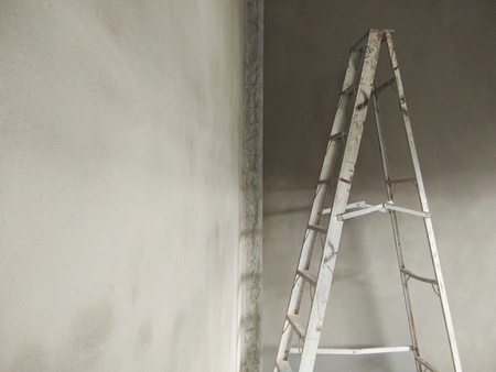 old aluminium ladder in side room with dramatic light,with copy spaceの写真素材