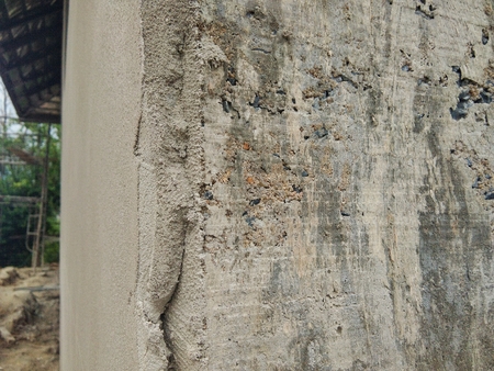 thickness cement plaster on the wall ,outside house construction