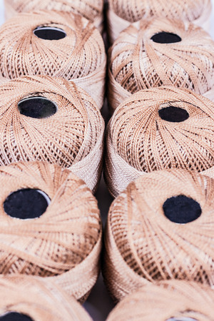 Cotton lustre spool on two rows in the store