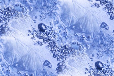 ice crystals & feathery jack frost patterns on window