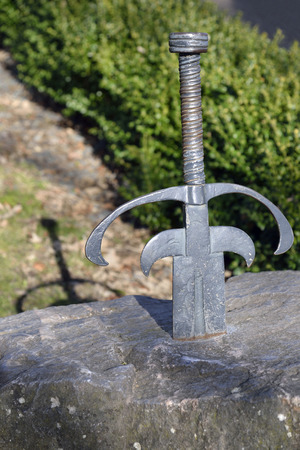 Sword in the Stone, Taunton Castle, SomersetReplica of King Arthur's Sword Excalibur, with Shadowの写真素材