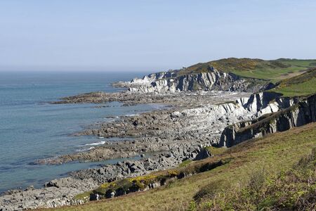 Low Tide at Rockham Beach with Bull Point Lighthouse beyond, North Devon, UK