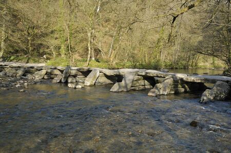 Tarr Steps Clapper Bridge over River Barle near Withypool
Viewed from South East sideの写真素材