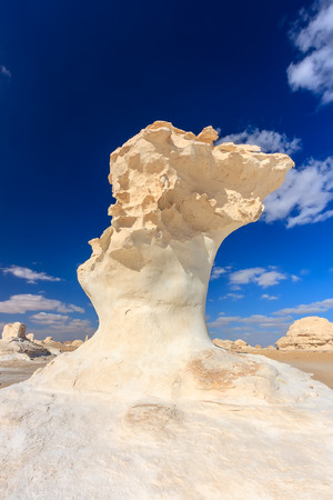 Eroded rock formations in a hot, dry desertの写真素材