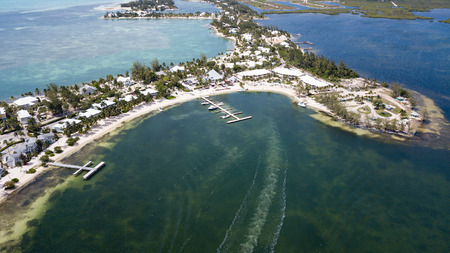 A narrow strip of land on a tropical islandの写真素材