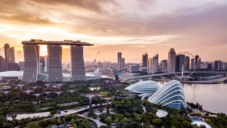 Aerial drone view of Singapore city skyline at sunsetのeditorial素材