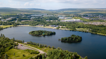 Aerial view of Bryn Bach park and lake in Tredegar, South Walesの写真素材