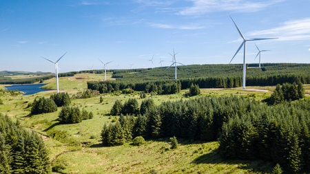 Aerial drone view of a large wind farm in a rural upland area (Pen y Cymoedd, South Wales)