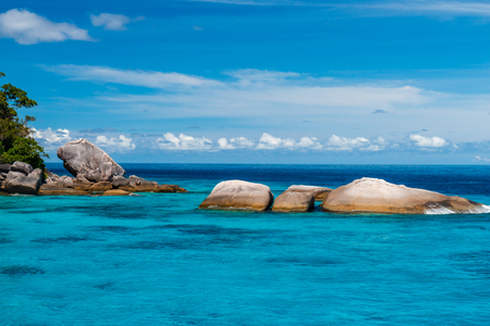 Beautiful turquoise tropical ocean and lush green islands (Similan Islands, Thailand)の写真素材