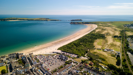 Aerial drone view of the picturesque and colorful Welsh seaside town of Tenbyの写真素材