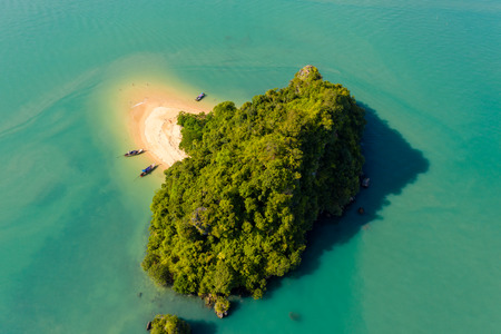 Aerial view of the tiny but beautiful beach and tropical island of Koh Nok, in Phang Nga, Thailandの写真素材