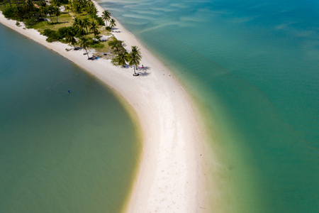 Aerial drone view of a beautiful sandy beach and tropical ocean (Laem Haad, Koh Yao Yai, Thailand)の写真素材