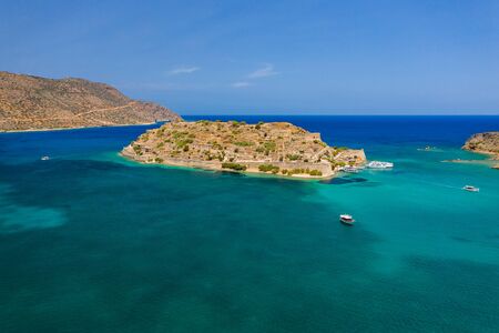 Aerial drone view of the ruins of the ancient Venetian fortress on the island of Spinalonga on the Greek island of Creteの写真素材