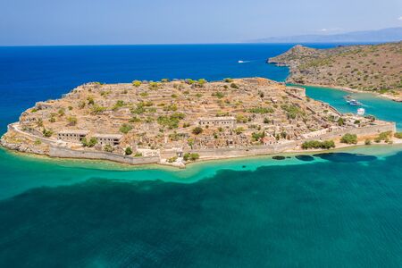Aerial drone view of the ruins of the fortress and leper colony on Spinalonga island, Crete Greeceの写真素材