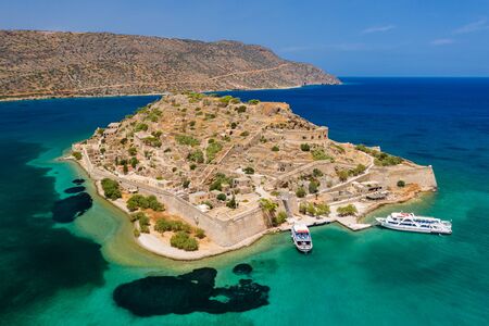 Aerial drone view of the ruins of the ancient Venetian fortress on the island of Spinalonga on the Greek island of Creteの写真素材