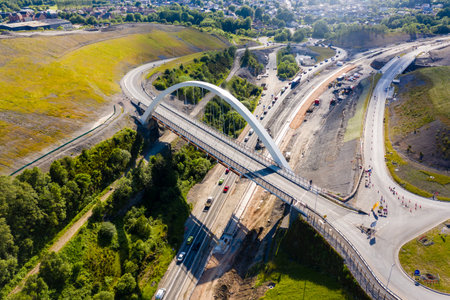 BRYNMAWR, WALES, UK - JULY 3, 2019: Aerial view of the new Jack Williams Gateway Bridge and the construction of the new A465 Heads of the Valleys road.  The Bridge is named after decorated World War 1 soldier Jack Williams following a public vote.のeditorial素材