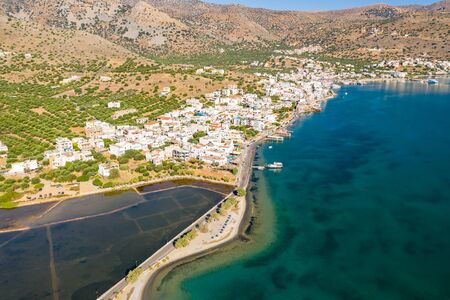 Aerial drone view of the town of Elounda on the Greek island of Crete in the middle of summerの写真素材