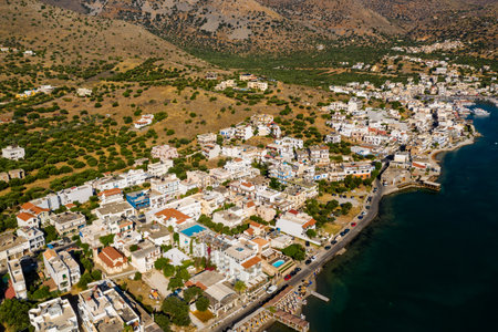 ELOUNDA, CRETE, GREECE - 13 JULY 2019: Aerial view of the up market town of Elounda on the greek island of Creteのeditorial素材