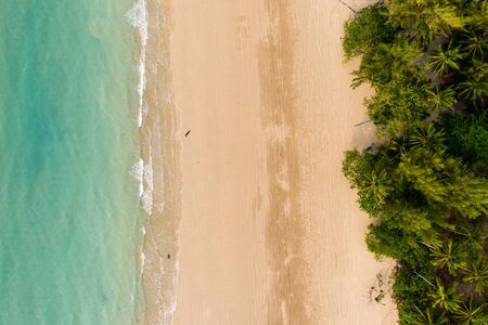 Top down aerial view of a deserted tropical beach in Thailand during the Coronavirus outbreak