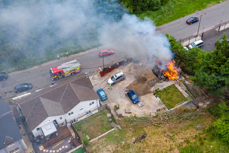 Aerial view of a large lake in a rural setting (Bryn Bach Park, South Wales, UK)の写真素材