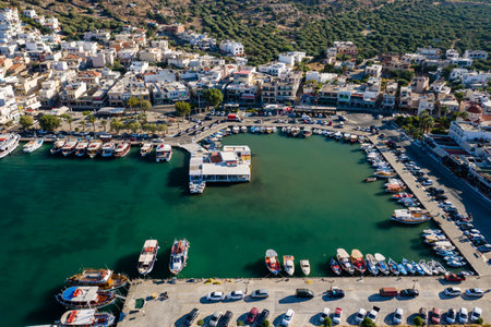 ELOUNDA, CRETE, GREECE - 27 AUGUST 2020: Aerial view of the harbor in the popular Greek tourist town of Elounda on the island of Creteのeditorial素材