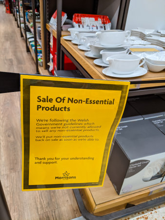 EBBW VALE, WALES, UK - OCTOBER 27 2020: Closed off aisles in a supermarket containing what the Welsh Government deem to be "non-essential items" and banned from sale. Items include clothes, toys, kitchen utensils and electrical items.のeditorial素材