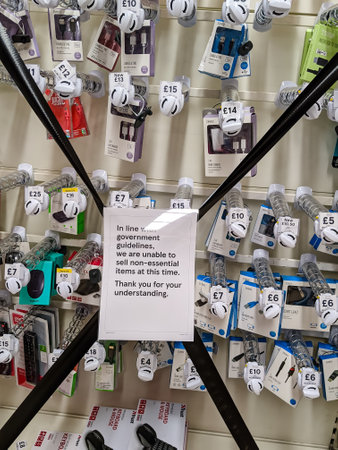 EBBW VALE, WALES, UK - OCTOBER 27 2020: Closed off aisles in a supermarket containing what the Welsh Government deem to be "non-essential items" and banned from sale. Items include clothes, toys, kitchen utensils and electrical items.のeditorial素材