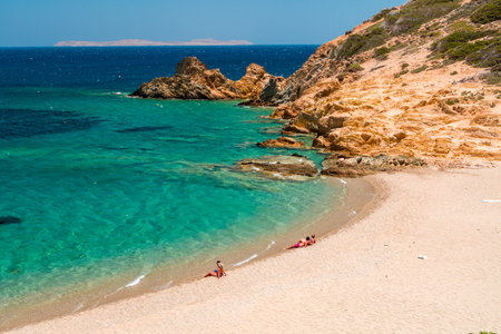 PSILI AMMOS, CRETE - 15 JULY 2021: People on the secluded beach of Psilio Ammos beach next to Vai in Eastern Creteのeditorial素材