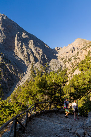 SAMARIA GORGE, CRETE - 20 JULY 2021: Hikers in the spectacular mountain and forest scenery of the Samaria Gorge on the Greek island of Creteのeditorial素材