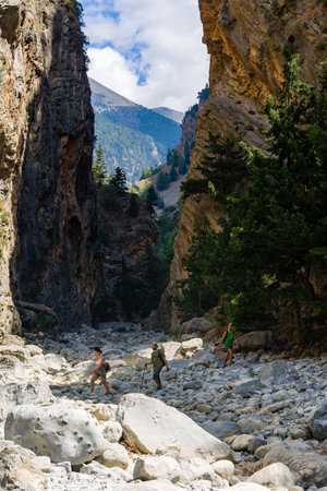 SAMARIA GORGE, CRETE - 20 JULY 2021: Hikers in the spectacular mountain and forest scenery of the Samaria Gorge on the Greek island of Creteのeditorial素材