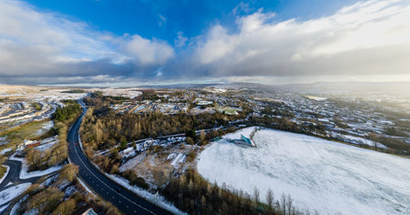 Panoramic aerial view of a snow covered Welsh town (Ebbw Vale)