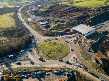 Aerial view of a roundabout and major roadworks at section 5 of the A465 "Heads of the Valleys" road in South Wales, UKの写真素材