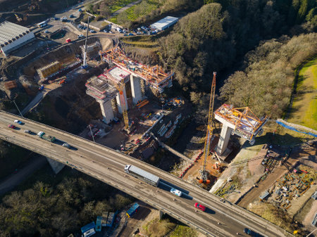 MERTHYR TYDFIL, WALES - FEBRUARY 06 2023: Aerial view of major roadworks and construction of section 5 of the upgraded A465 "Heads of the Valleys" Road at Merthyr Tydfil, South Walesのeditorial素材