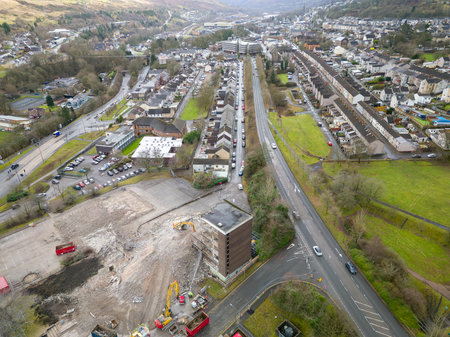 EBBW VALE, WALES - FEBRUARY 03 2023: Aerial view of the demolition of the old council offices in the centre of the town as part of a regeneration planのeditorial素材