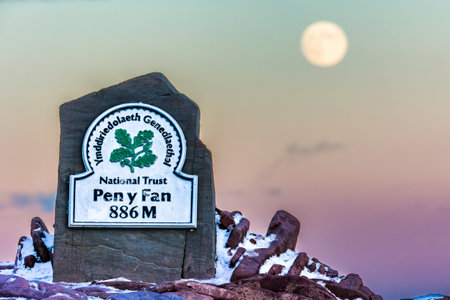 PEN-Y-FAN, WALES - DECEMBER 12 2022: Image of the summit of Pen-y-Fan in the Brecon Beacons at sunset. Pen-y-Fan is the tallest peak in the mountain range at 886m.のeditorial素材