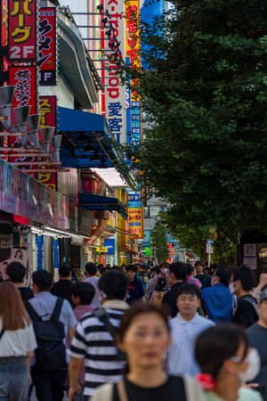 TOKYO, JAPAN - JULY 16 2023: Crowds of shoppers in the streets of Akihabara in Tokyo. The district is famous for electronics and anime culture.のeditorial素材