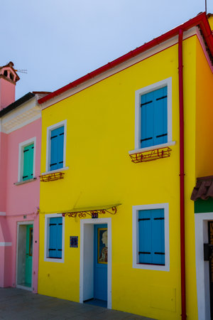 Brightly colored buildings on the Italian island of Burano in the Venetian Lagoon near Veniceの写真素材