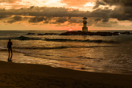 Silhouette of a tropical sunset from a beach in Thailand (Khao Lak, Thailand)の写真素材