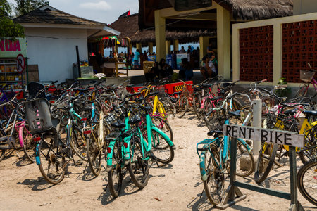 Rental bicycles near the main harbor on the small island of Gili Air.  Indonesia's Gili Islands allow no motorised transport.のeditorial素材